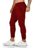 Men's Solid Elastic Waist Lace-up Tapered Trousers